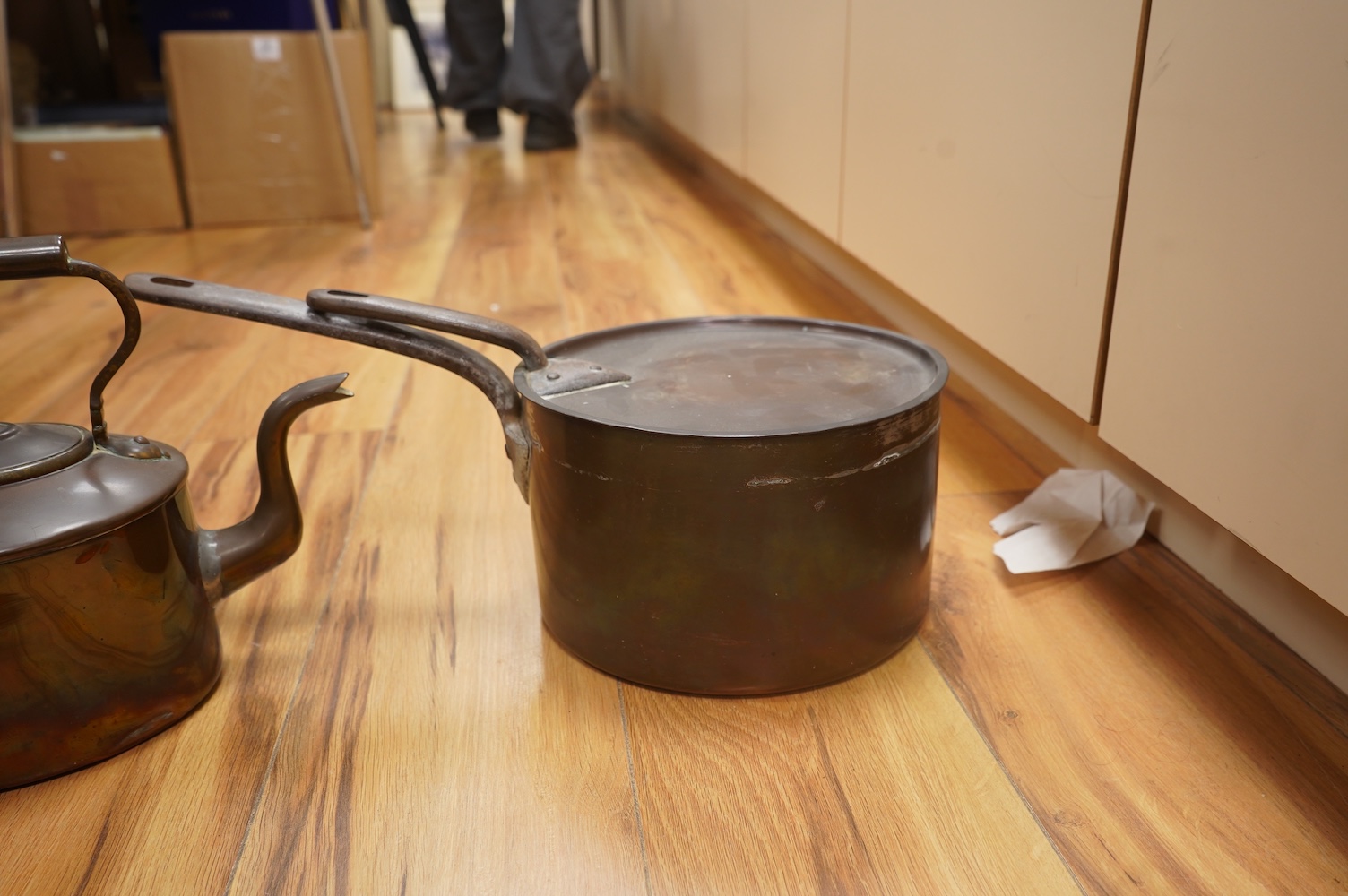 Two Benham & Froud copper saucepans and a copper kettle, largest 43cm in length